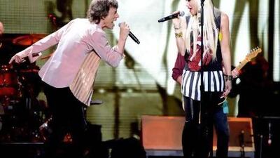 Mick Jagger and Gwen Stefani performed Wild Horses in Los Angeles in May. Kevin Mazur / AFP