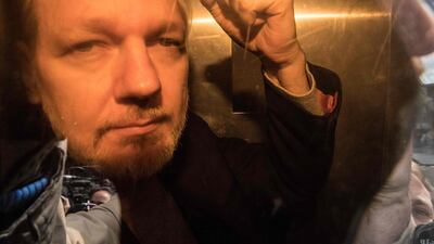 WikiLeaks founder Julian Assange arrives at court in London on May 1, 2019 to be sentenced for bail violation. AFP