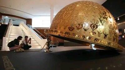 The artwork 'Message/Messenger' by the Saudi artist Abdulnasser Gharem sold for $842,000, more than 10 times its original estimate. Ali Hiader / EPA