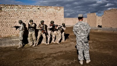 American military training with Iraqi soldiers during an exercise on approaching and clearing buildings in Baghdad in 2015. AFP