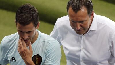 Belgium's Eden Hazard, left, walks off the pitch with his coach, Marc Wilmots, at half-time during the Euro 2016 round of 16 match against Hungary. Francois Mori / AP Photo / June 26, 2016