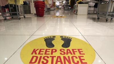 Safety stickers at the Redtag store in Al Naeem City Centre in Ras Al Khaimah. Pawan Singh / The National