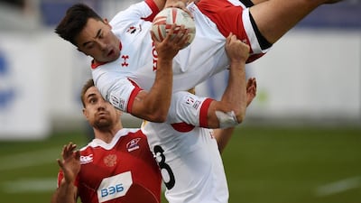 Nathan Hirayama of Canada is lifted to receive the ball against Russia during the second day of the men’s USA Rugby Sevens tournament in Las Vegas. Mark Ralston / AFP Photo