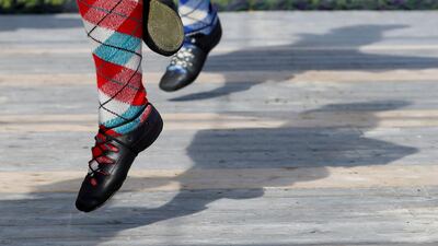 Competitors participate in highland dancing at the annual Braemar Highland Gathering in Braemar, Scotland, Britain. Reuters