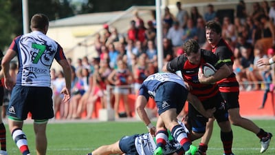 Both teams tackle hard as the Jebel Ali Dragons II take on The Sharjah Wanderers in the finals of the UAE Conference at the Sharjah Wanderers Sports Club on 25 March, 2016. Navin Khianey for The National