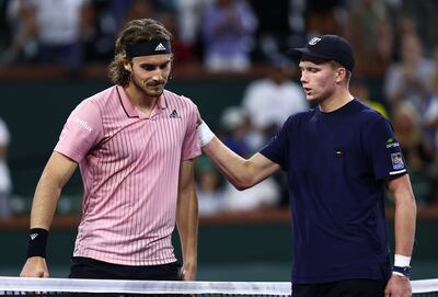 Jenson Brooksby, right, delivered a shock victory over world No 5 Stefanos Tsitsipas. AFP