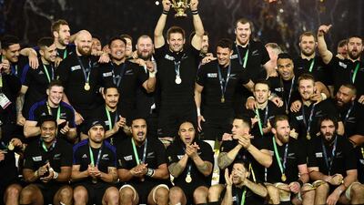 3. Rugby World Cup 2015. New Zealand’s flanker and captain Richie McCaw lifts the Webb Ellis trophy. Martin Bureau / AFP Photo