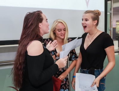 Saskia Roth, right, is happy after getting her GCSE results at Dubai British School.