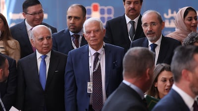 Front row, from left, Iraq's Foreign Minister Fuad Hussein, EU foreign chief Josep Borrell and Jordan's Foreign Minister Ayman Safadi at a donor conference in Brussels. EPA