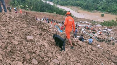 A member of India's National Disaster Response Force at the landslide in Noney district, Manipur state. EPA