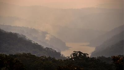 Smoke rises from bushfires in valleys surrounding the Hawkesbury River near the town of Kulnura, New South Wales, Australia. Bloomberg