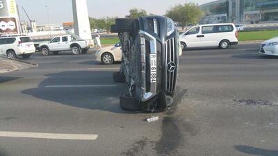 On Sunday, a vehicle overturned on Sheikh Zayed Road from Al Manara Bridge to Al Safa Bridge. Two vehicles crashed into one another, which caused one of them to flip over. No injuries were reported. Courtesy Dubai Police
