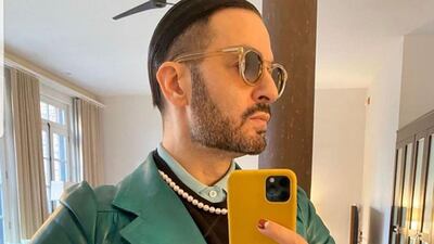 Designer Marc Jacobs modelling a vintage coat on Work From Home Fits. Instagram / wfhfits