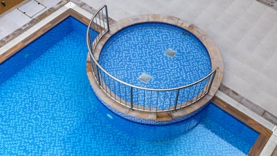 She has a pool view. The building was constructed in 2012
