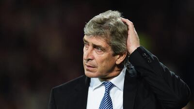 Manchester City manager Manuel Pellegrini reacts during his side's Premier League loss to Crystal Palace on Monday night. Jamie McDonald / Getty Images / April 6, 2015