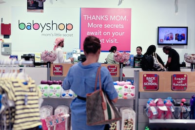 Shoppers browse products at Babyshop in Oasis Centre in Dubai. Landmark Group will introduce the Babyshop brand in four cities across India over the next six months. Sarah Dea / The National