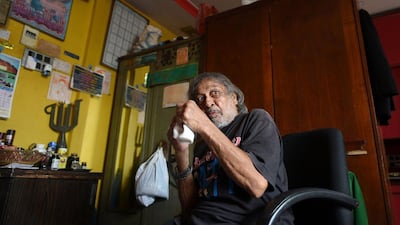 In this photograph taken on June 6, 2016, former Indian boxer Haroon Younis Khan, 72, reminisces about his bouts with boxing legend Muhammad Ali during an interview with AFP in Mumbai. Indranil Mukherjee / AFP