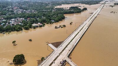 Flooding continues to blight parts of the Philippines, with entire villages submerged and scores of towns without electricity, after Super Typhoon Fung-wong wrought havoc. AFP