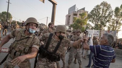 BEIRUT, LEBANON - SEPTEMBER 12: Anti-government protesters clash with security forces during a march toward the Presidential Palace, on September 12, 2020 in Baabda, Beirut, Lebanon. (Photo by Sam Tarling/Getty Images)