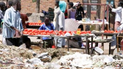 At a vegetable market in Harare, there is almost as much rubbish as there is produce.