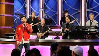 The charismatic Filipino boxer has somehow managed to drag a piece of schmalzy music to a top 10 ranking in the charts.