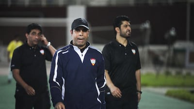 UAE national team coach Mahdi Ali, centre, pictured during a friendly against the Philippines in Abu Dhabi on November 9, 2013, faces a tough task as his side attempt to defend their Gulf Cup title. Lee Hoagland / The National