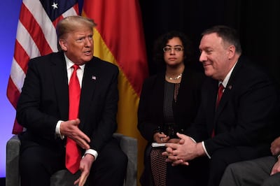 In October, Donald Trump, left, decided to withdraw US forces from northern Syria, which resulted in Turkey launching an offensive against the Kurds there. AFP