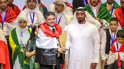 Rabbie Ahmed receives an award from Deputy Prime Minister and Minister of Interior Sheikh Saif bin Zayed