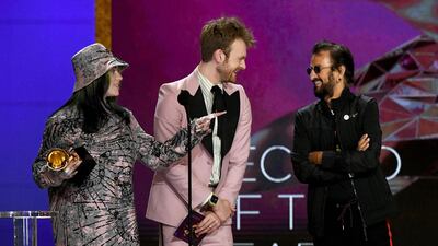 Billie Eilish and Finneas accept the Record of the Year award for 'Everything I Wanted' from Ringo Starr onstage during the 63rd Grammy Awards at Los Angeles Convention Center. AFP