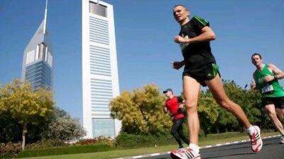 Runners compete in the Dubai Marathon. Marathons are a natural habitat for Mamils. Duncan Chard for the National