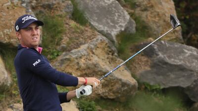 Justin Thomas of the United States watches his shot on the 12th hole during the final round of the CJ Cup golf tournament at Nine Bridges on Jeju Island, South Korea. Park Ji-ho / AP Photo
