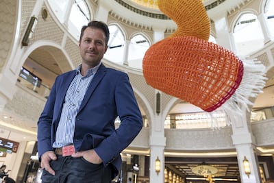 Jason Hackenwerth flew from Florida with 20,000 balloons in his luggage to build 'Skyward' in Dubai. Antonie Robertson / The National