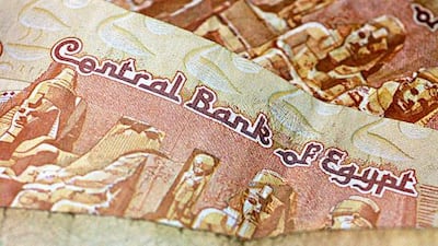 The Egyptian currency was devalued to 8.85 pounds from the official rate of 7.73 pounds. Daniel Acker / Bloomberg News