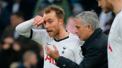 Tottenham Hotspur manager Jose Mourinho, right, does not know if Christian Eriksen will be staying or leaving the club this month. AFP
