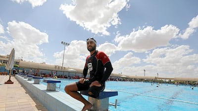 Egyptian swimmer Omar Hegazy, who is the first amputee to swim across the Gulf of Aqaba from Egypt to Jordan, rests after practice in Cairo on May 20, 2017. Mohamed Abd El Ghany / Reuters
