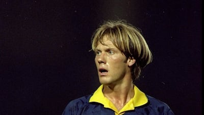 Warren Barton sported the 'curtains' look during his Wimbledon days. Allsport