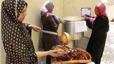 Libyan women prepare food for rebels in the rebel-held city of Misrata.