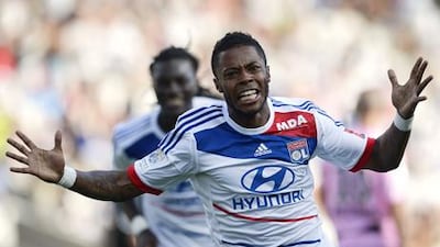 Michel Bastos celebrates his goal for Lyon against Troyes