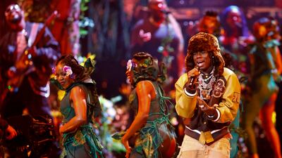 Afrobeats musician Rema (R) performed during the ceremony. EPA