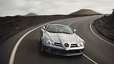 Without the roof, the staccato roar of the Mercedes McLaren SLR's 5.5L V8 can be fully enjoyed, but the driver and passenger will still be able to hold a conversation.
