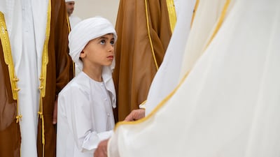 Sheikh Zayed bin Theyab bin Mohamed greets a guest at the event at Mushrif Palace. Mohamed Al Hammadi / UAE Presidential Court