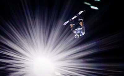 Wenlong Yang of China competes in the Men's Snowboard Big Air qualification round, at the Winter Olympic Games in Livigno, Italy. EPA