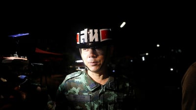 A military officer blocks the entrance of the Tham Luang cave complex, as members of an under-16 soccer team and their coach have been found alive, according to a local media's report, in the northern province of Chiang Rai, Thailand, on July 2, 2018. Soe Zeya Tun / Reuters