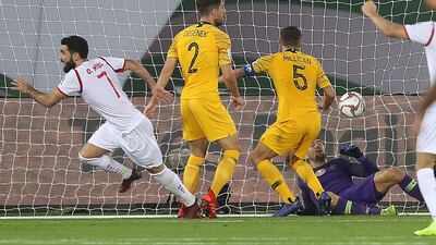 Omar Khrbin of Syria celebrates after scoring the equalising goal. Getty Images