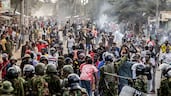Demonstrators confront Kenyan police officers during clashes at a protest against a US-built Ebola quarantine centre slated to begin operations at Laikipia air base in Nanyuki. AFP