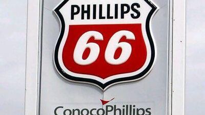 ConocoPhillips will divide into two pieces: the world's largest pure refiner, and the biggest non-state exploration and production (E&P) company. AP Photo