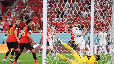 Thibaut Courtois of Belgium dives in vain as Abdelhamid Sabiri scores for Morocco. Getty