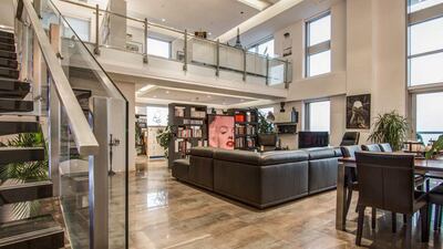 The unit, which is on the 50th floor, was originally handed over by the developer as shell and core space. But its owner, who has held the property for five years, was keen to ensure it retained the loft “feel” by retaining a double-height, central living space. Courtesy Luxhabitat