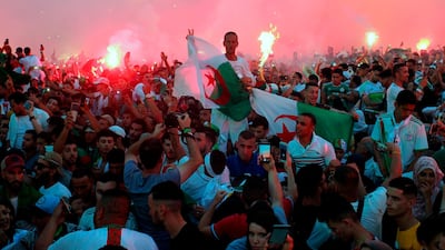 Algerian fans celebrate after their team won the 2019 Africa Cup of Nations final between Senegal and Algeria, in Algiers. AFP