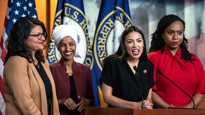 Democratic Representatives Rashida Tlaib, Ilhan Omar, Alexandria Ocasio-Cortez and Ayanna Pressley speak about President Donald Trump's Twitter attacks against them. Jim Lo Scalzo / EPA